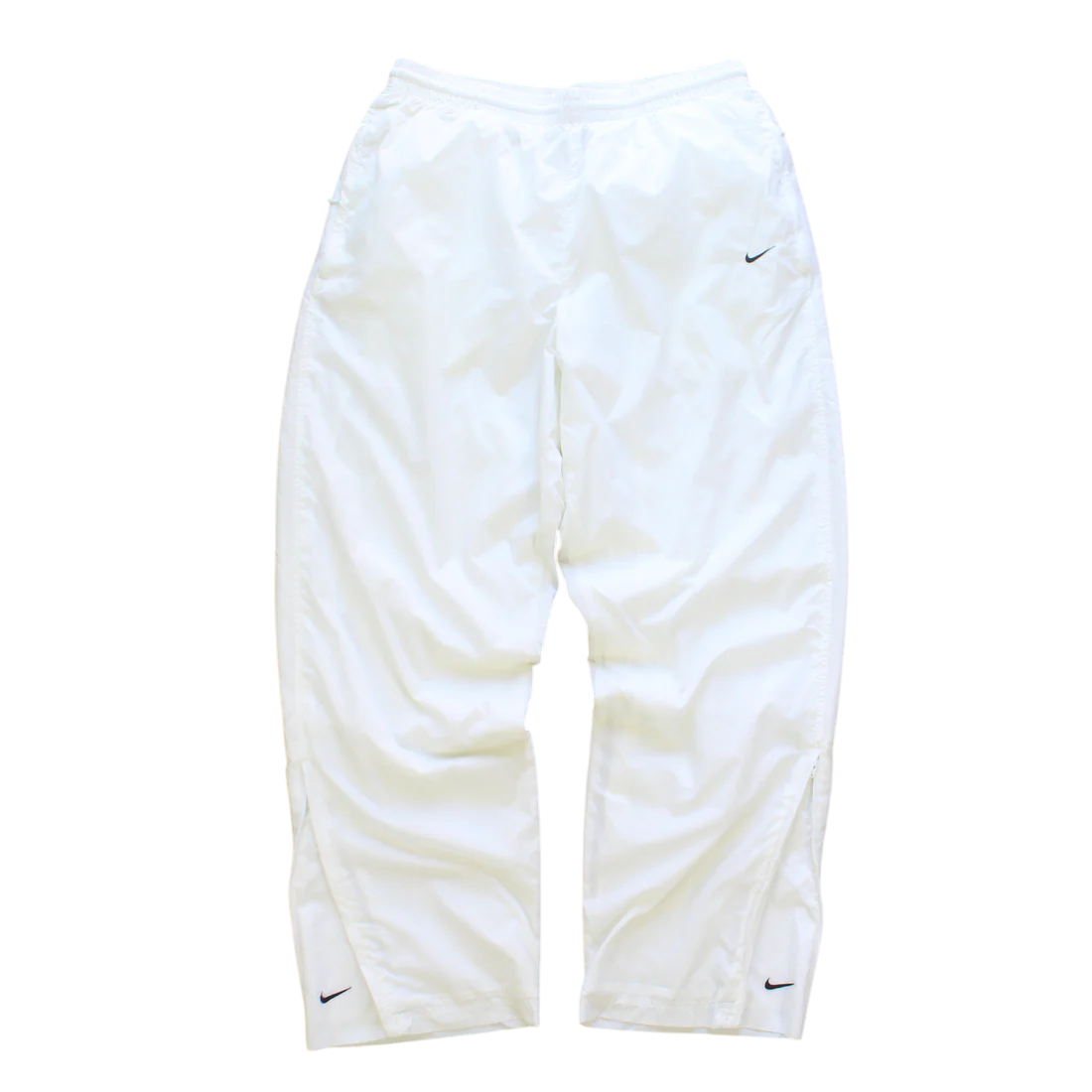 Pantalones deportivos Nike blancos (talla L)